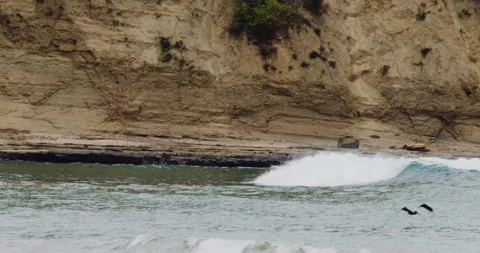 Mesmerizing Slow Motion Waves Crashing on Rocky Beach - High-Quality Stock Stock Footage 240963379