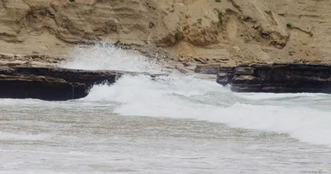 Mesmerizing Slow Motion Waves Crashing on Rocky Beach - High-Quality Stock Stock Footage 240964088