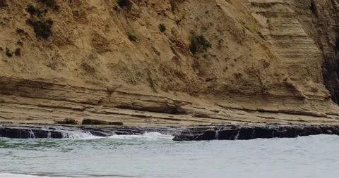 Mesmerizing Slow Motion Waves Crashing on Rocky Beach - High-Quality Stock Stock Footage 240966377