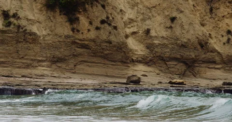 Mesmerizing Slow Motion Waves Crashing on Rocky Beach - High-Quality Stock Stock Footage 240966523