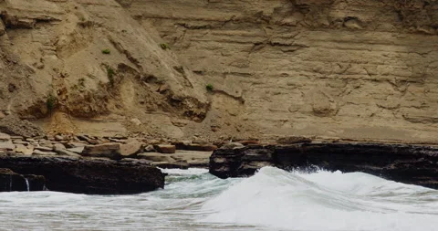 Mesmerizing Slow Motion Waves Crashing on Rocky Beach - High-Quality Stock Stock Footage 240966567