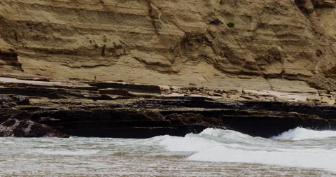 Mesmerizing Slow Motion Waves Crashing on Rocky Beach - High-Quality Stock Stock Footage 240966705