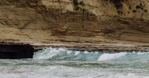 Mesmerizing Slow Motion Waves Crashing on Rocky Beach - High-Quality Stock Stock Footage 240966711