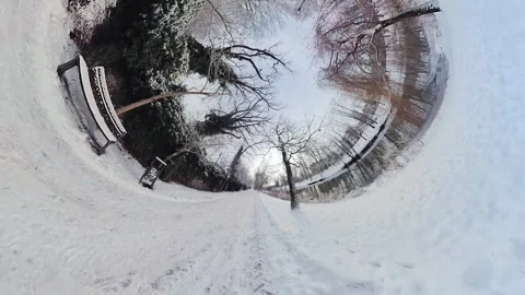 Mesmerizing Snowy Path through a Picturesque Park Stock Footage 268778538