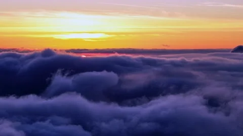 Mesmerizing Sunrise Over Rippling Clouds, Ocean of Cloudscapes, Enigmatic Aura Stock-Footage 265148375