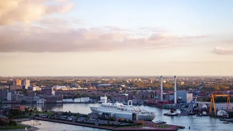Mesmerizing Timelapse of Rotterdam's Shipyard Under Gorgeous Evening Skies Stock Footage 312930976