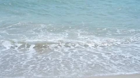 Mesmerizing Video of Gentle Waves Ebbing and Flowing Along the Shoreline Stock Footage 244749103