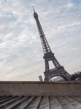 A mesmerizing view of the iconic Eiffel Tower in the early morning in Paris,  Stock Photos