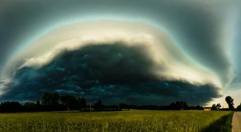 Mesocyclone supercell storm cloud over a field. Stock Photos