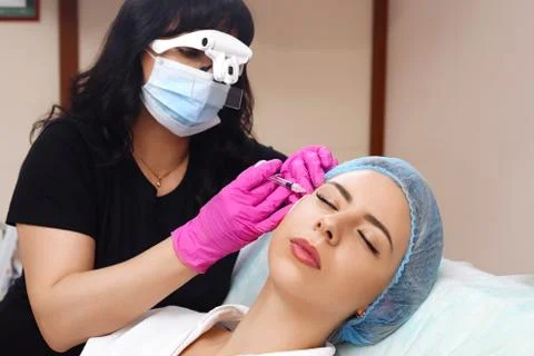 Mesotherapy injections in the face. Stock Photos