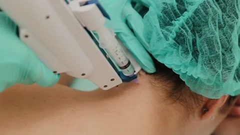 The mesotherapy procedure in process. Beautician doing injection against aging Stock Footage 134681922