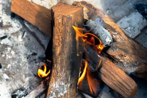 Mesquite logs on fire Stock Photos