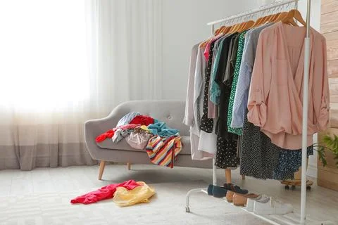 Mess in dressing room, space for text. Renew wardrobe Stock Photos