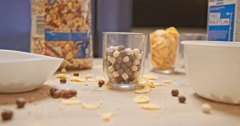 Mess in the kitchen at breakfast - cereals , cornflakes Video stock 146178379