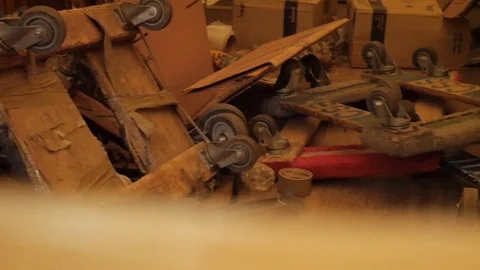 Mess of Moving Dolly Carts Laying On Truck Floor Stock Footage 129499586