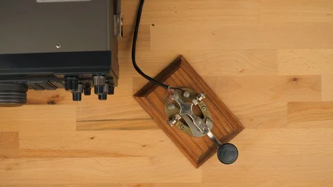 A message being sent via Morse code on a shortwave radio Stock Footage 129738456