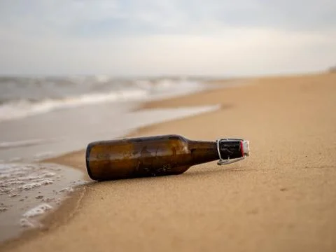 Message in a bottle on the beach Stock Photos