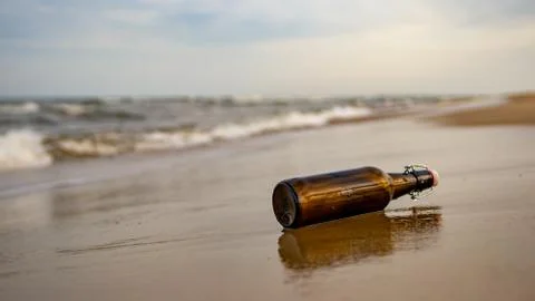 Message in a bottle on the beach Stock Photos