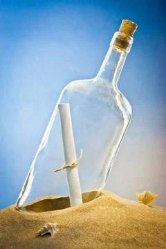 Message in bottle on sand Foto stock