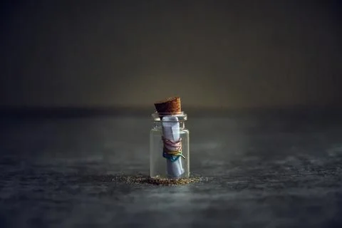 Message in a bottle on the table Stock Photos