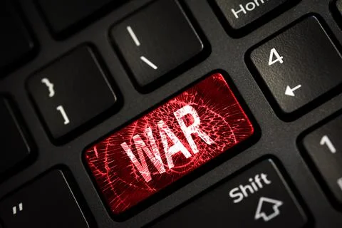 Message on broken red enter key of keyboard. Computer Ukraine war attack warn Stock Photos
