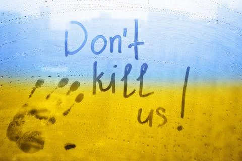 Message call Dont kill us and handprint are painted handwriting on window wit Stock Photos