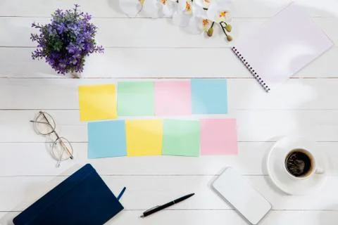 Message at colorful note papers on a desk background. Stock Illustration