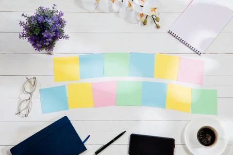 Message at colorful note papers on a desk background. Stock Illustration