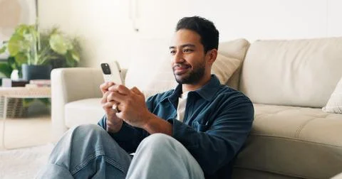 Message, connection and man in home with phone, online chat and post reacti.. Stock Photos