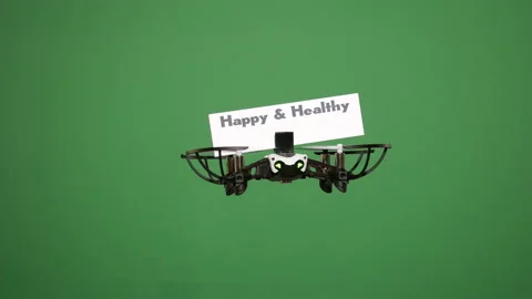 Message delivery by drone : season's greetings on a green screen Stock Footage 99338900