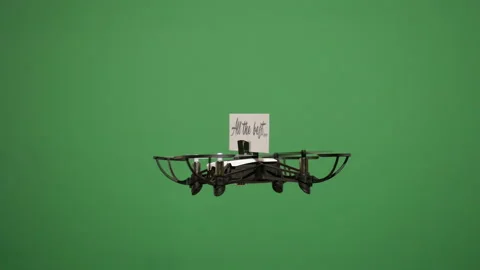 Message delivery by drone : season's greetings on a green screen Stock Footage 99340701