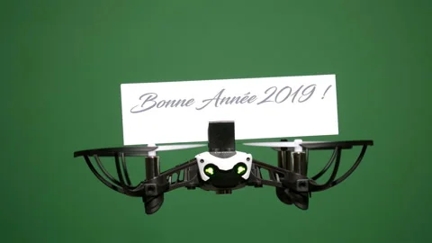 Message delivery by drone : season's greetings on a green screen Stock Footage 99345113