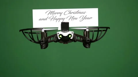 Message delivery by drone : season's greetings on a green screen Stock Footage 99355217