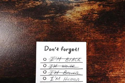Message I'm human don't forget on wood desk Stock Photos