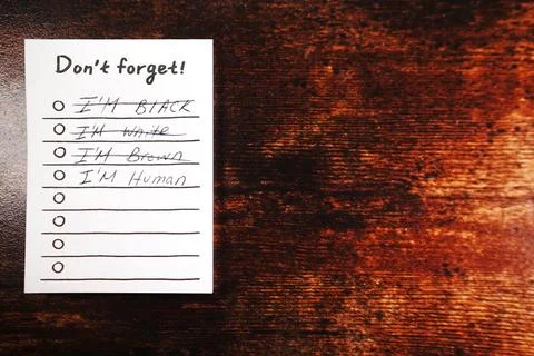 Message I'm human don't forget on wood desk Stock Photos