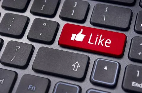 Like message on keyboard button, social media concepts A like message on e... Stock Photos
