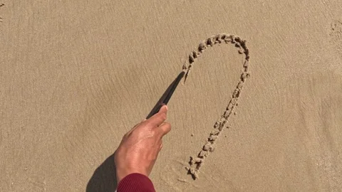 The message'' love '' on the sand with hand drawing on the beach 動画素材 245710683