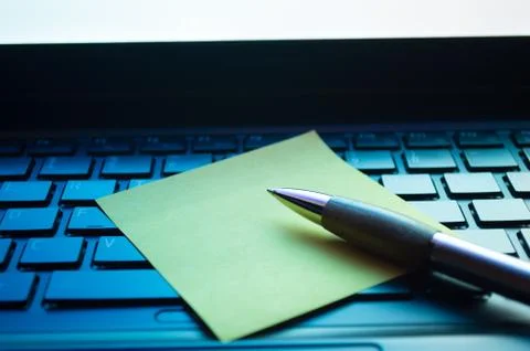 Message note on laptop keyboard Stock Photos