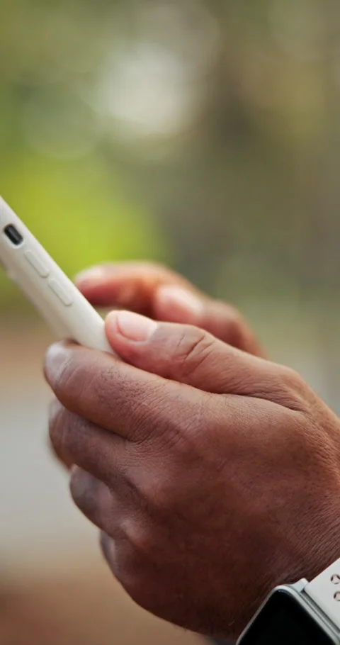 Message, scroll and hands with phone, outdoor and communication with contact on Stock Footage 340967027