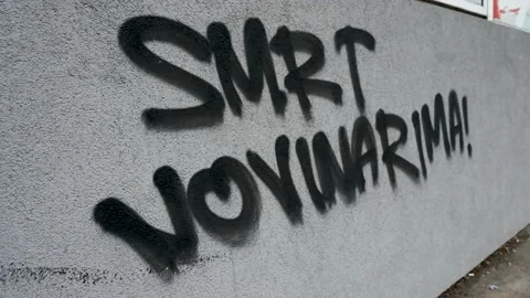 Message on the wall: "Death to journalists". Call for violence. Hate speech Stock Footage 174737535