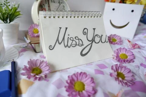 The message was written instead of the feelings in the heart on white note paper Stock Photos