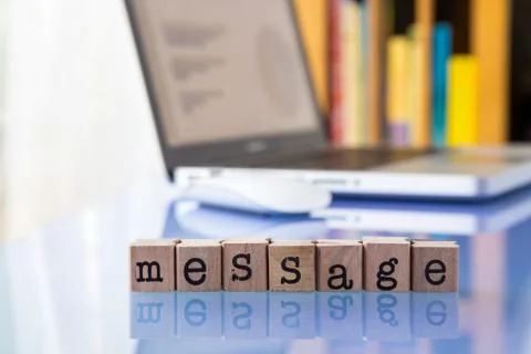 Message word on glass table with reflection Stock Photos