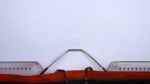 Message- word printed on an old typewriter in red letters, close up. Stock Footage 126644564