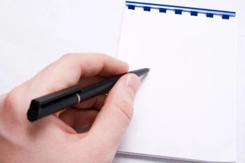Message write - hand writing on blank notepad Stock Photos