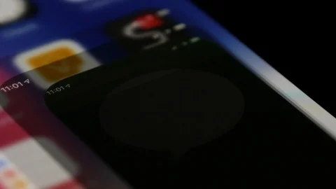 Messages app icon on the iPhone. Opening the application to see new Stock Footage 123890835