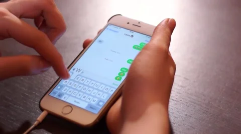 Messaging on iphone 6 gold Stock Footage 46197520