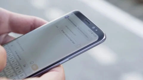 Messaging on phone Stock Footage 85224319