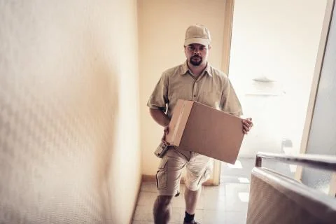 Messenger Delivering Parcel Stockfoto's