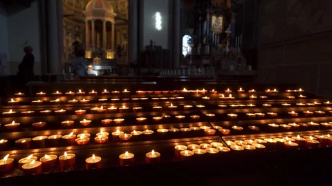 MESSINA, ITALY - NOVEMBER 06, 2018 - Many burning candles in the catholic church Stock Footage