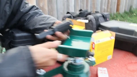 Messing around with gun equipment Stock Footage 114213915